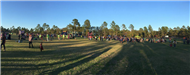Panoramic view of Howl-O-Scream participants in the meadow at night