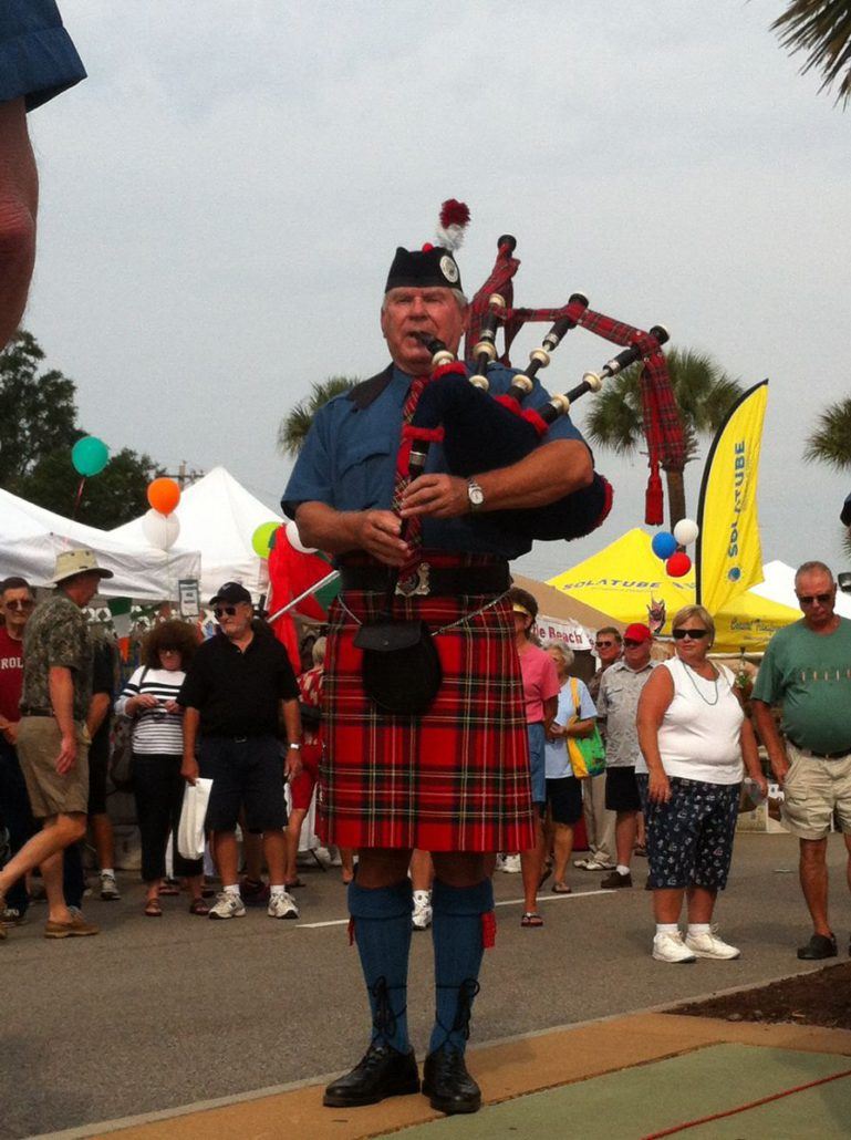 Man Playing Bagpipes