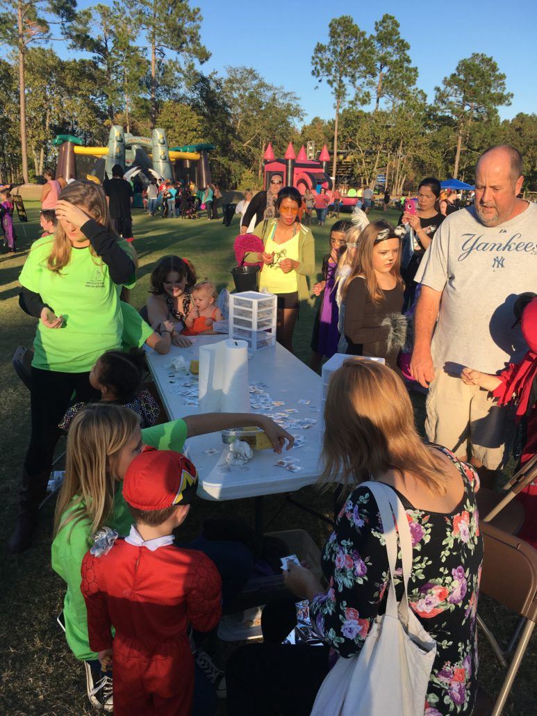 Children getting temporary tattoos at the Tattoo Station